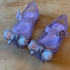 Melissa Girls' Purple Glitter Jelly Mary Janes with Bow Accent